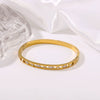 Wholesale Women's Elegant Round Square Hollow Design Titanium Steel Bracelet With 18K Gold Color Vacuum Plated Finish