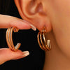 Wholesale Women's Exaggerated Geometric Metal Circle Earrings With Electroplating Design