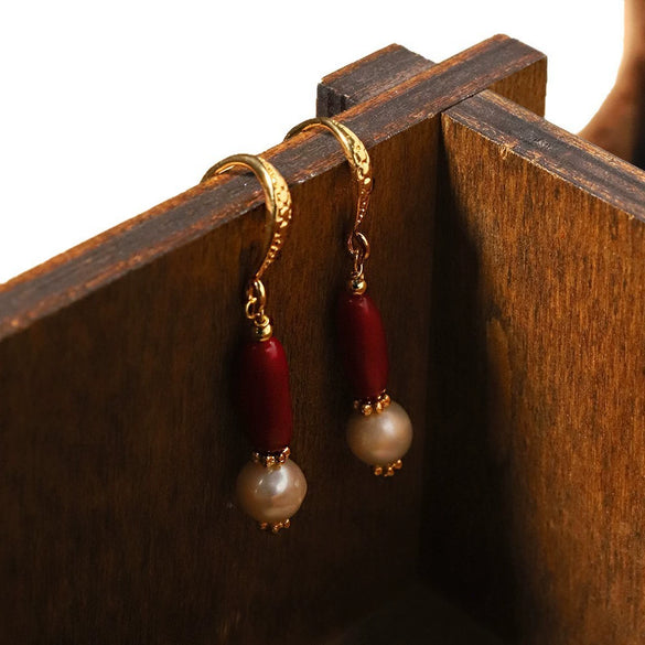 Wholesale Women's Exotic Geometric Natural Pearl Earrings With Sea Bamboo Red Tassel And Electroplated Ear Hooks