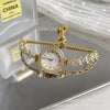 Wholesale Women's Fashion Alloy Bracelet Quartz Watch With Round Dial And Mermaid Style