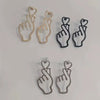 Wholesale Women's Fashion Geometric Copper Hollowout Heart Earrings With Electroplating