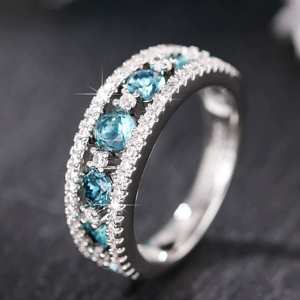 Wholesale Women's Fashion Geometric Copper Ring With Sapphire Blue And Hollow Design And Zircon Treatment