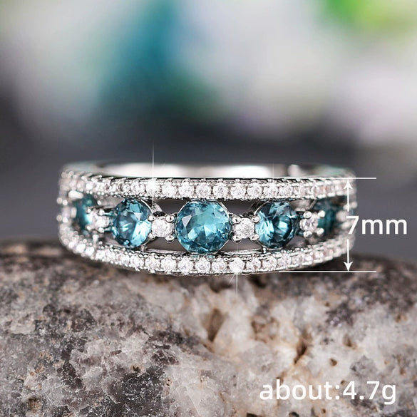 Wholesale Women's Fashion Geometric Copper Ring With Sapphire Blue And Hollow Design And Zircon Treatment