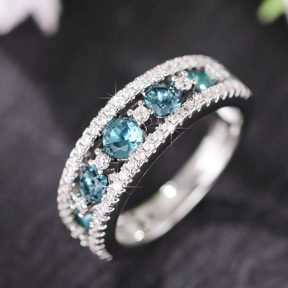 Wholesale Women's Fashion Geometric Copper Ring With Sapphire Blue And Hollow Design And Zircon Treatment