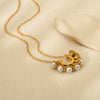 Wholesale Women's Fashion Geometric Drop Shape Hollow Fanshaped Pendant Stainless Steel And Titanium Steel Necklace With 18K Gold Plated Oshaped Chain