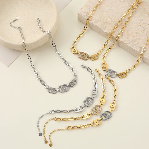 Wholesale Women's Fashion Geometric Stainless Steel And Titanium Steel Necklace And Bracelet Set With Heart Water Drop And Bell Patterns Electroplated