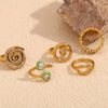 Wholesale Women's Fashion Geometric Stainless Steel 18K Gold Electroplated Swirl Knotted Daisy Ring
