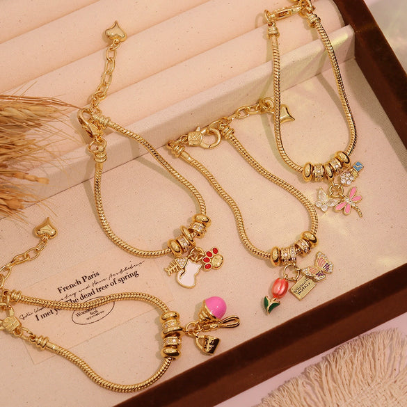 Wholesale Women's Fashion Gold Plated Copper Flower Butterfly Pendant Bracelet With Real Gold Plating