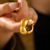 Wholesale Women's Fashion Hollow Flower Smooth Geometric Ring In Stainless Steel With 18K Real Gold Electroplating