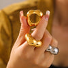 Wholesale Women's Fashion Hollow Flower Smooth Geometric Ring In Stainless Steel With 18K Real Gold Electroplating