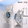 Wholesale Women's Fashion Jewelry Copper Zircon Xshaped Hollow Earrings With Flower Pattern