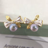 Wholesale Women's Fashion Natural Freshwater Pearl Oblate S925 Sterling Silver Earrings