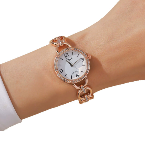 Wholesale Women's Fashion Quartz Watch With Aurora Fritillary Surface Hollow Alloy Case And Strap Round Dial