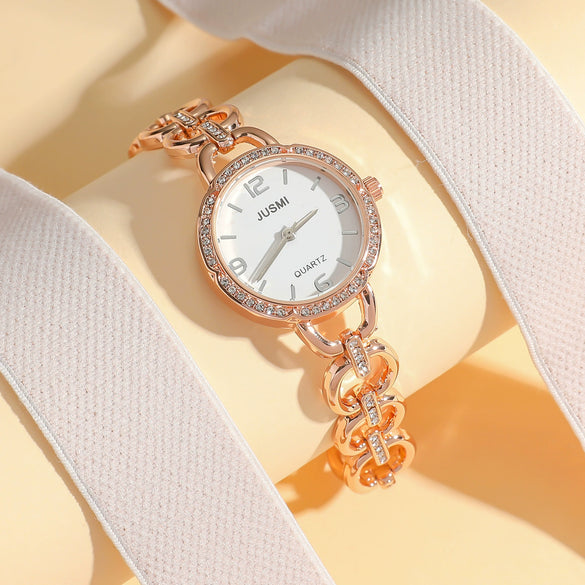 Wholesale Women's Fashion Quartz Watch With Aurora Fritillary Surface Hollow Alloy Case And Strap Round Dial