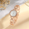 Wholesale Women's Fashion Quartz Watch With Aurora Fritillary Surface Hollow Alloy Case And Strap Round Dial