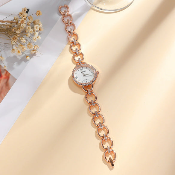 Wholesale Women's Fashion Quartz Watch With Aurora Fritillary Surface Hollow Alloy Case And Strap Round Dial