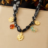 Wholesale Women's Fashion Retro Creative Heartshaped Stainless Steel Goldplated Relief Flower Pattern Beaded Pendant Necklace With Rope Chain