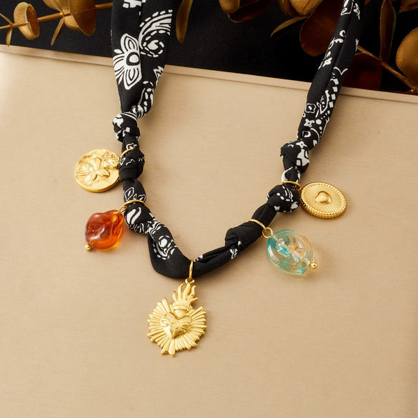 Wholesale Women's Fashion Retro Creative Heartshaped Stainless Steel Goldplated Relief Flower Pattern Beaded Pendant Necklace With Rope Chain