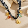 Wholesale Women's Fashion Retro Creative Heartshaped Stainless Steel Goldplated Relief Flower Pattern Beaded Pendant Necklace With Rope Chain