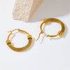Wholesale Women's Fashion Retro Geometric Titanium Steel Round Twist Earrings With Electroplating