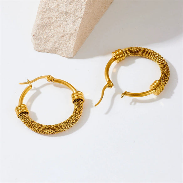 Wholesale Women's Fashion Retro Geometric Titanium Steel Round Twist Earrings With Electroplating