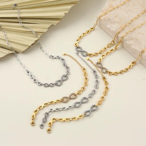 Wholesale Women's Fashion Stainless Steel And Titanium Steel Jewelry Set With Heart Water Drop Bell Patterns Electroplated Infinity Symbol Necklace And Bracelet