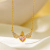 Wholesale Women's Fashion Titanium Steel And Copper Electroplated Heart Shape Micropaved Zirconia Angel Wings Pendant Necklace With O Word Chain Jewelry