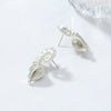 Wholesale Women's Fashion Wave Pattern Zinc Alloy Conch Earrings With Electroplating