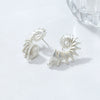 Wholesale Women's Fashion Wave Pattern Zinc Alloy Conch Earrings With Electroplating