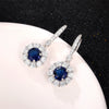 Wholesale Women's Fashionable Copper Long Earrings With Sapphire Blue Zircon And Flower Design