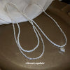 Wholesale Women's Fashionable Retro Lovely Pearl Stitching Double Layer Clavicle Chain Necklace With Heart Shaped Pendant And Pearl Chain