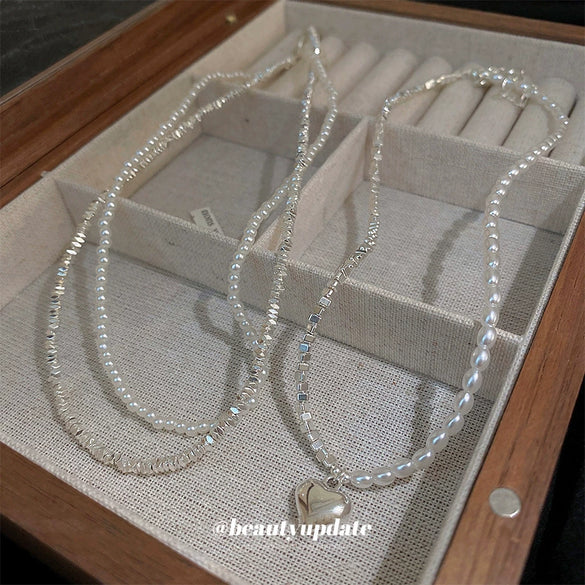 Wholesale Women's Fashionable Retro Lovely Pearl Stitching Double Layer Clavicle Chain Necklace With Heart Shaped Pendant And Pearl Chain