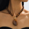 Wholesale Women's Flower Patterned Acrylic And Zinc Alloy Beaded Necklace With Electroplating