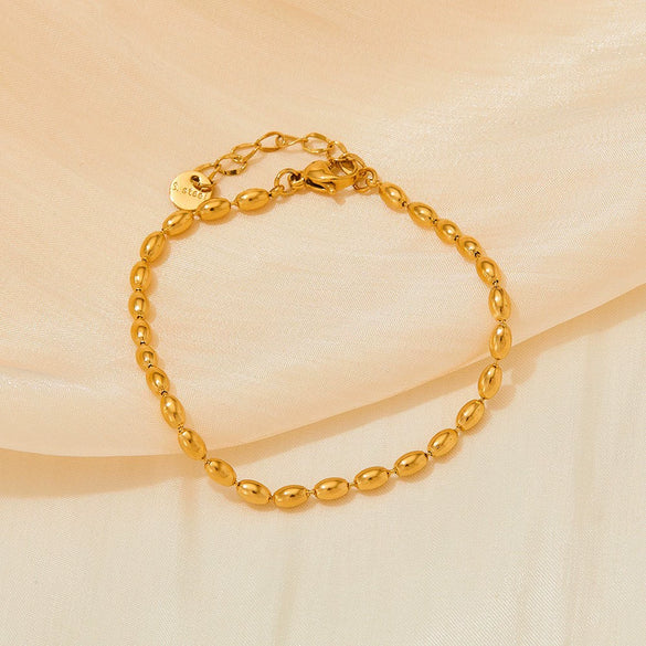Wholesale Women's French Retro Exquisite Stainless Steel Bracelet With Oval Gold Beads Olive Beads And Geometric Pattern Chain Electroplated