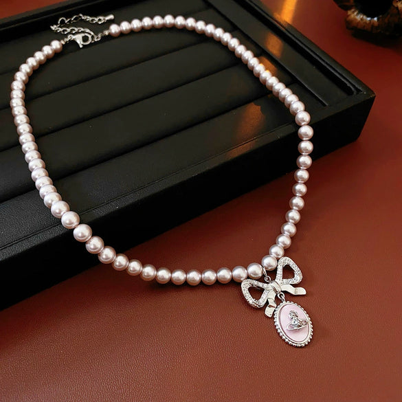 Wholesale Women's French Retro Light Luxury Clavicle Chain Set With Alloy Pendant And Imitation Pearls Electroplating