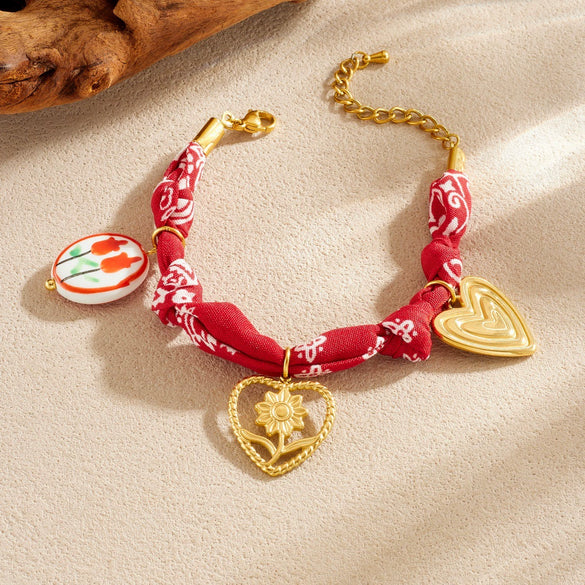 Wholesale Women's French Retro Printed Rope Chain Goldplated Cut Out Stainless Steel Heartshaped Flower Ceramic Pendant Bracelet