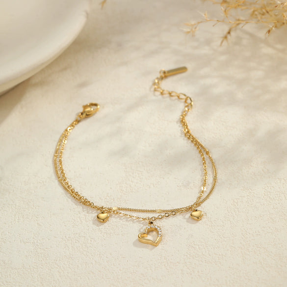 Wholesale Women's Geometric Diamondencrusted Hollow Heart 18K Gold Electroplated Stainless Steel Bracelet