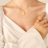 Wholesale Women's Geometric Doublesided Portrait Pendant Clavicle Necklace Titanium Steel Goldplated Jewelry