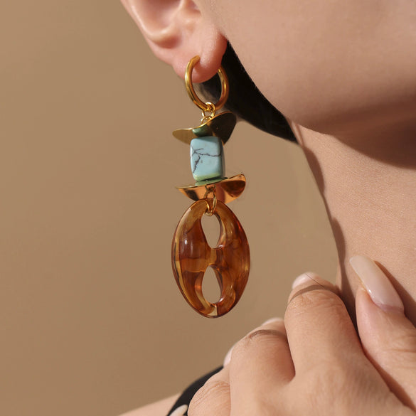 Wholesale Women's Geometric Ferris Wheel Oval Pig Nose Electroplated Stainless Steel Resin Turquoise Earrings