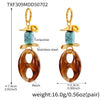 Wholesale Women's Geometric Ferris Wheel Oval Pig Nose Electroplated Stainless Steel Resin Turquoise Earrings