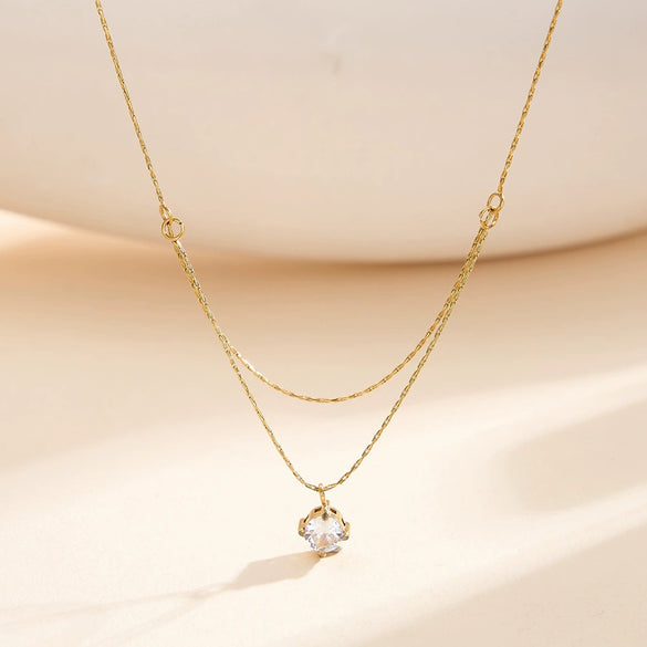 Wholesale Women's Geometric Fourclaw Zircon Pendant Necklace With Real Gold Plating And Calendering Chain