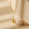 Wholesale Women's Geometric Fruit Food Style Croissant Pendant Necklace Made Of Stainless Steel And Titanium Steel With Electroplating