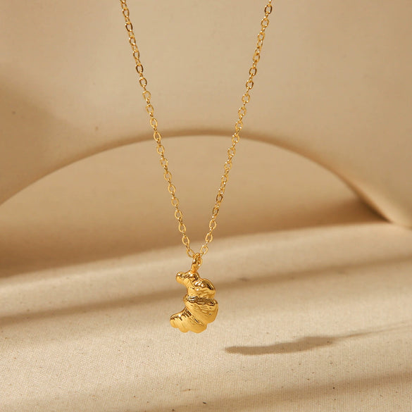 Wholesale Women's Geometric Fruit Food Style Croissant Pendant Necklace Made Of Stainless Steel And Titanium Steel With Electroplating