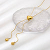 Wholesale Women's Geometric Gold Plated Stainless Steel Snake Bone Chain Heart Tassel Pullout Necklace