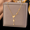 Wholesale Women's Geometric Goldpatterned Butterfly Tassel Clavicle Chain Titanium Steel Necklace With Real Gold Plating