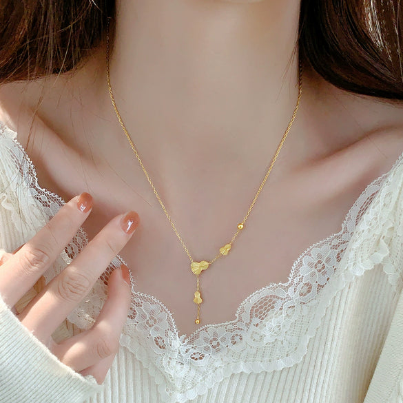 Wholesale Women's Geometric Goldpatterned Butterfly Tassel Clavicle Chain Titanium Steel Necklace With Real Gold Plating