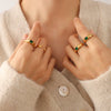 Wholesale Women's Geometric Green Diamond Zircon Inlaid Goldplated Titanium Steel Ring