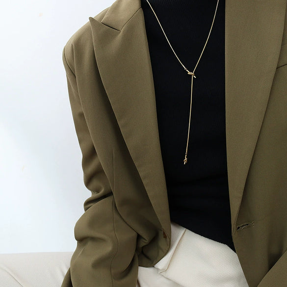 Wholesale Women's Geometric Heart Shaped Knotted Tassel Adjustable Sweater Chain Necklace In Titanium Steel With 18K Gold Plated Finish