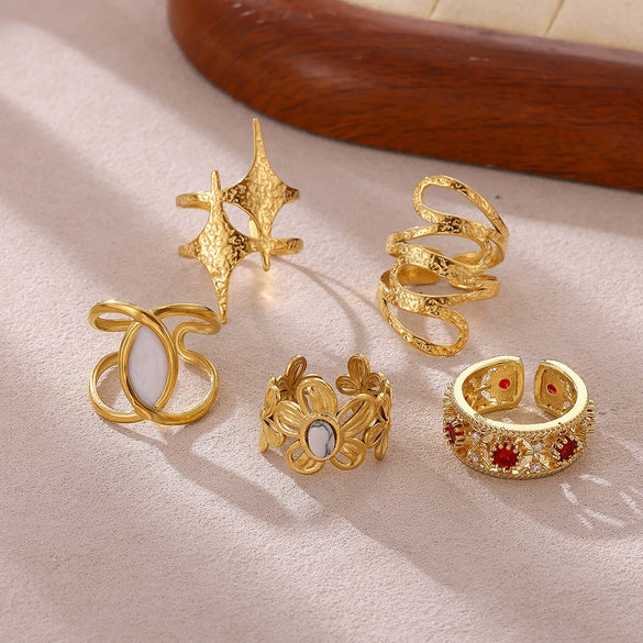 Wholesale Women's Geometric Hollow Flower Goldplated Inlaid With Gold Stainless Steel Zircon Ring With Fruit Shape And Pattern Light Luxury Style