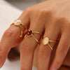 Wholesale Women's Geometric Hollow Stainless Steel Ring With Inlaid Oval Natural Stone And Pvdp Furnace Real Gold Treatment